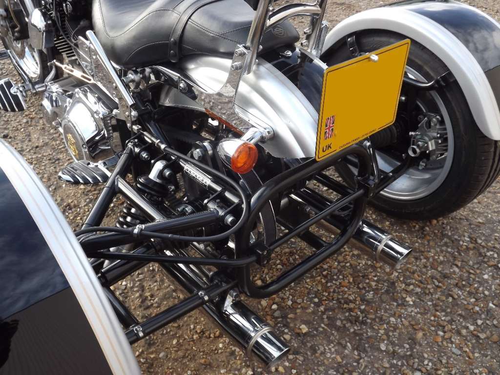 Casarva Harley Davidson Dyna FXDL Trike with our Independent rear suspension (IRS), reverse, raked front forks, twin stainless exhausts and Casarva Tall Custom Sissy Bar in mirror polished stainless steel.