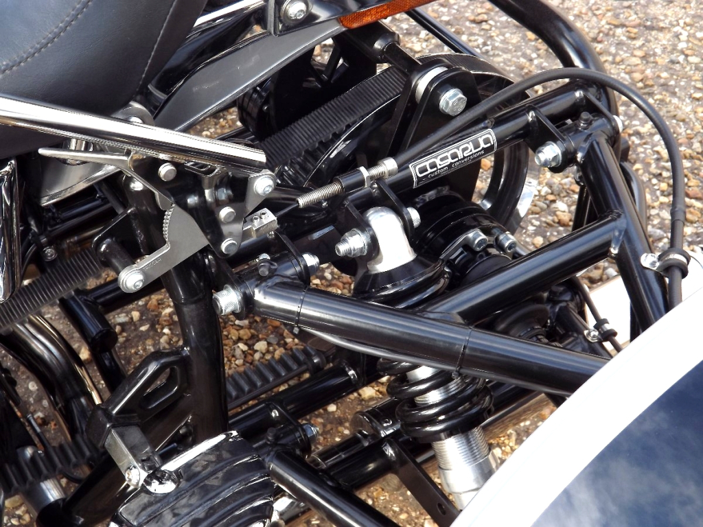 Casarva Harley Davidson Dyna FXDL Trike with our Independent rear suspension (IRS), reverse, raked front forks, twin stainless exhausts and Casarva Tall Custom Sissy Bar in mirror polished stainless steel.