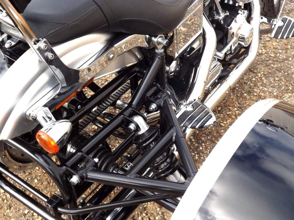 Casarva Harley Davidson Dyna FXDL Trike with our Independent rear suspension (IRS), reverse, raked front forks, twin stainless exhausts and Casarva Tall Custom Sissy Bar in mirror polished stainless steel.