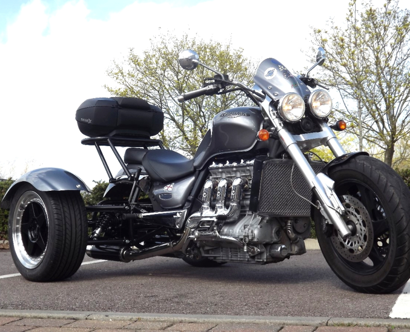 Casarva Triumph Rocket 111 Trike with reverse gearbox, raked front forks, Casarva custom rack and Casarva Stainless twin exhausts. #casarva