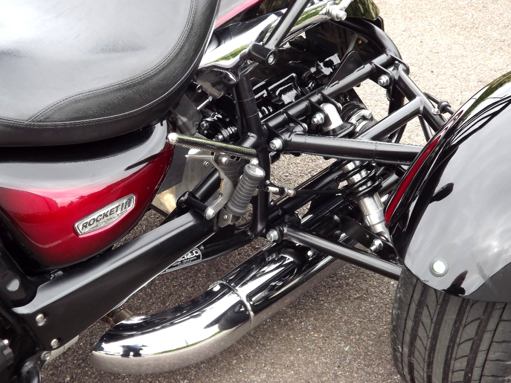 Casarva Triumph Rocket 111 Trike with reverse gearbox, raked front forks, Casarva custom rack and Casarva stainless rerouted twin exhausts. #casarva