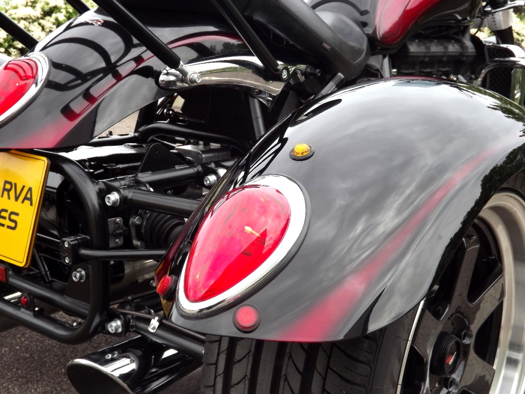 Casarva Triumph Rocket 111 Trike with reverse gearbox, raked front forks, Casarva custom rack and Casarva stainless rerouted twin exhausts. #casarva