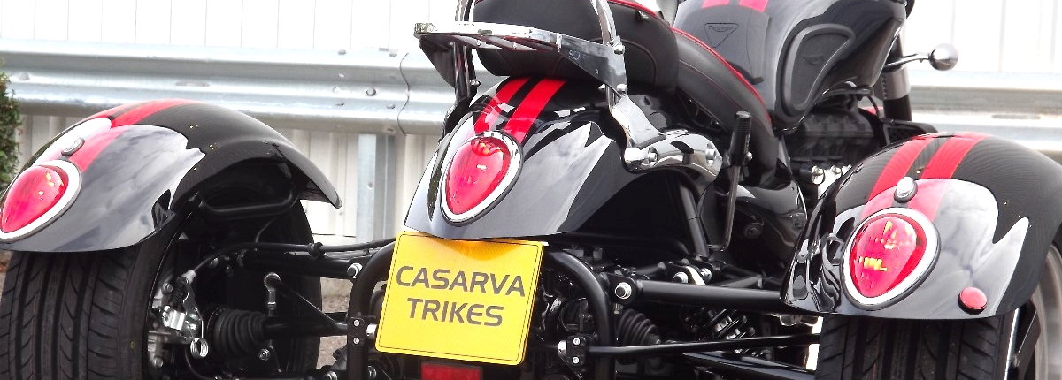 CASARVA TRIUMPH ROCKET 111 ROADSTER IRS TRIKE WITH RAKED FRONT FORKS, CASARVA REVERSE GEARBOX AND MATCHING RED STRIPE PAIN TO THE CASARVA MUDGUARDS